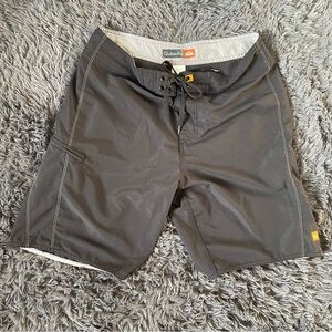 SOLD Quiksilver Black w/ Orange Accents Swim Trunks